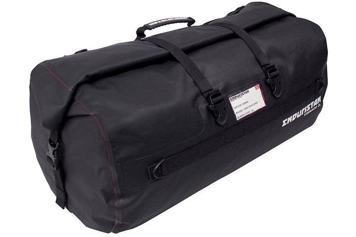Large black waterproof duffle bag for motorcycle travel